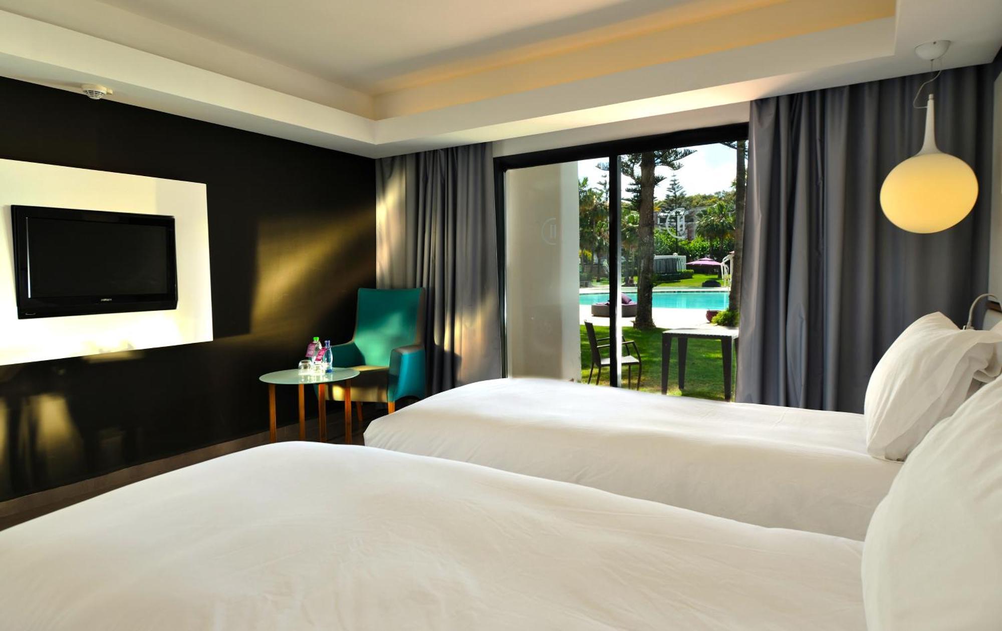 Pullman Mazagan Royal Golf & Spa El Jadida Kültér fotó A room at the hotel
