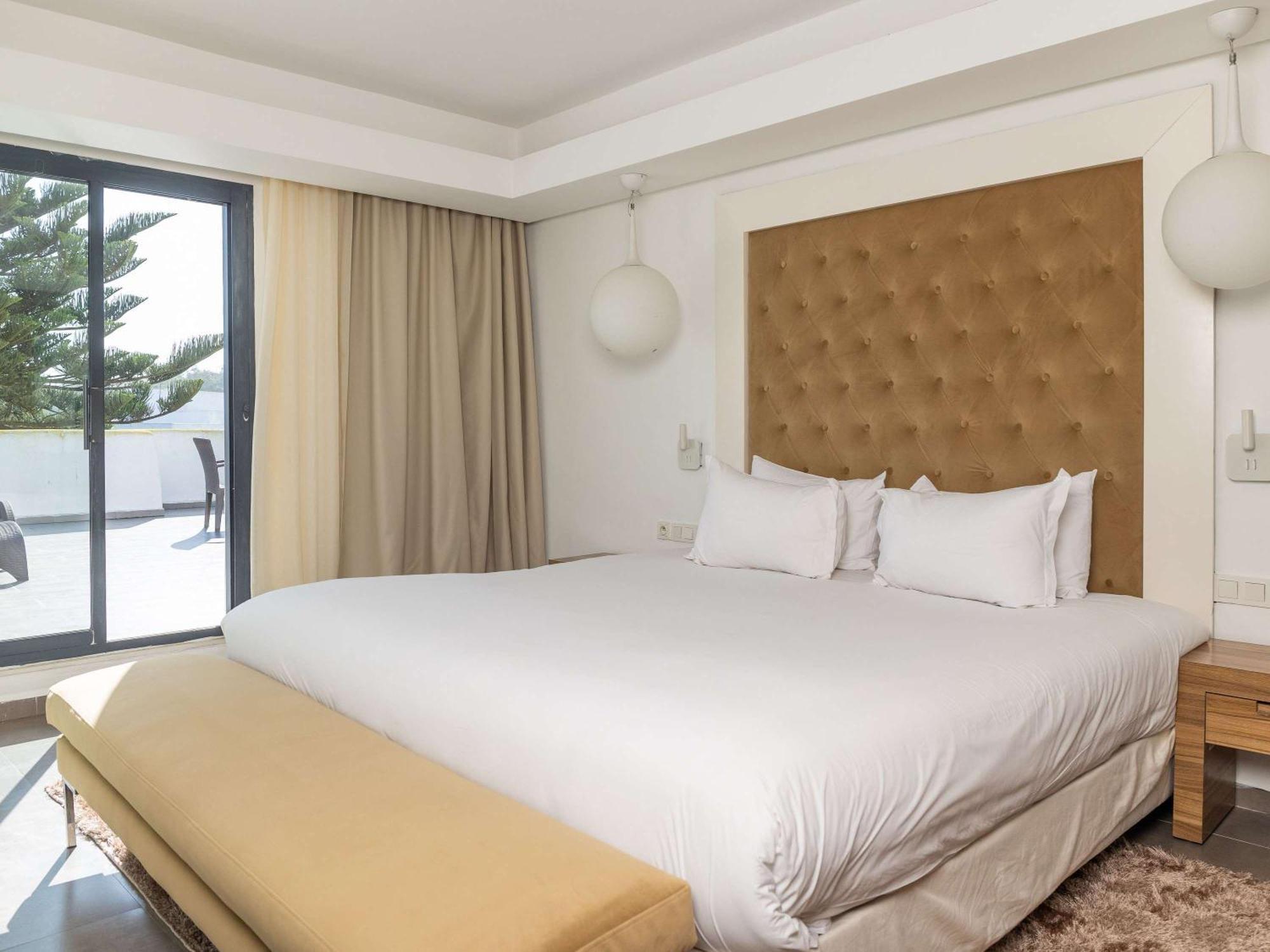 Pullman Mazagan Royal Golf & Spa El Jadida Kültér fotó A bedroom at the hotel